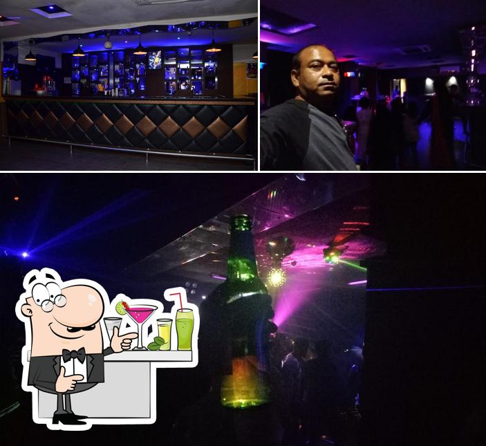 The picture of bar counter and beer at Novus Tanzanite - Bar & Discotheque