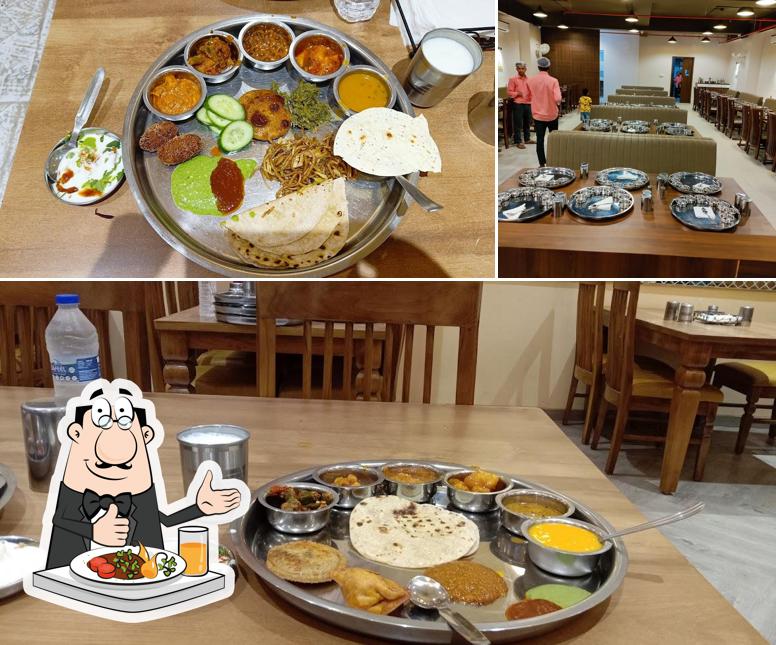 Check out the photo displaying food and interior at Thakkar Thal