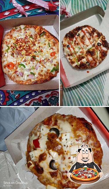 Try out pizza at Pizza Place