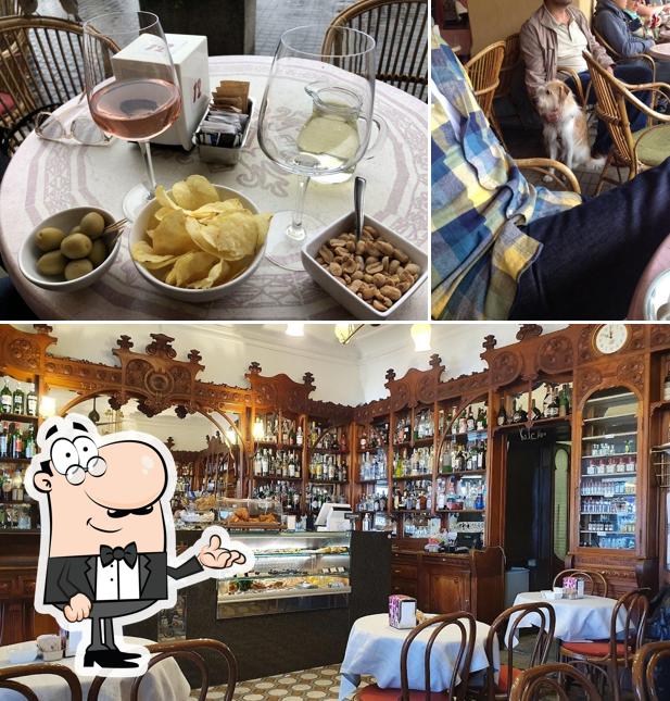 Siediti a un tavolo di Bar Pasticceria Rossi