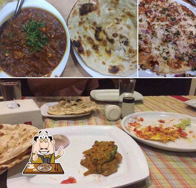 Try out pizza at Sunrise Restaurant