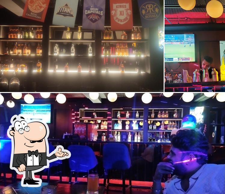 Take a seat at one of the tables at Kairo Bar and Lounge