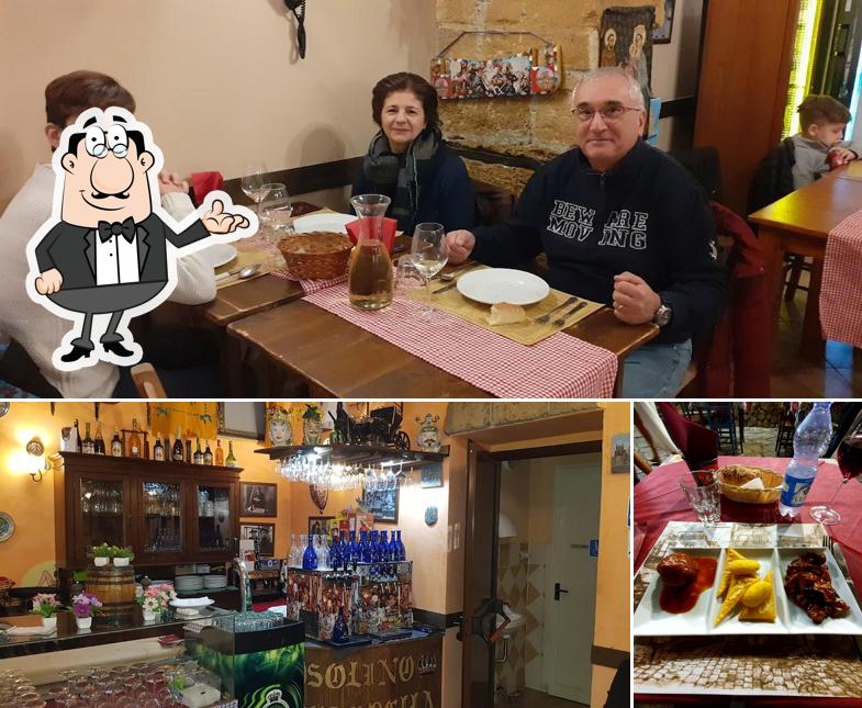 Questa è la immagine che presenta la interni e alcol di Osteria Al Casareccio