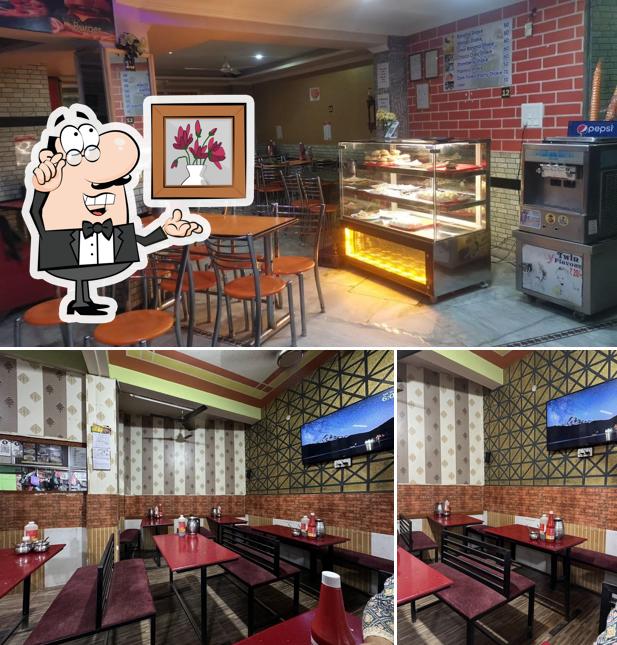 Take a seat at one of the tables at Manoj Chinese Corner