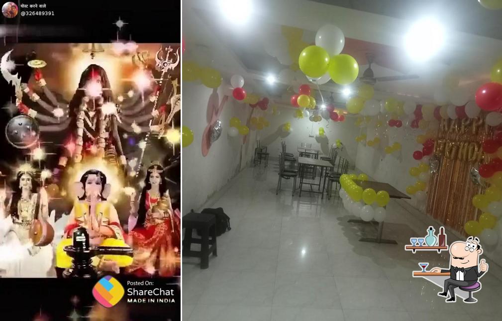 Take a seat at one of the tables at Sardar ji Restaurant (veg and non veg restaurant)