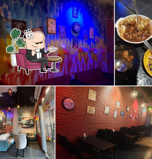 Take a seat at one of the tables at Hooters Indian Restro Bar Best Family Restaurant In Amritsar Best Café in Amritsar Best Restaurant in Amritsar