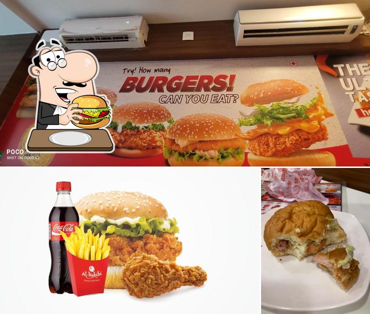 Try out a burger at Al Habibi Fried Chicken