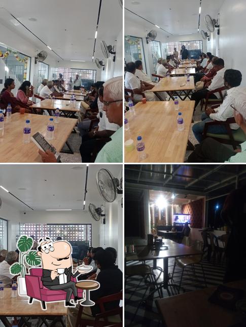 Take a seat at one of the tables at The Sachin's Kitchen