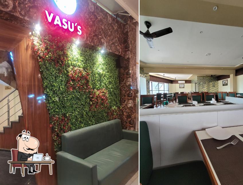 Take a seat at one of the tables at SAI Veg Cuisine Restaurant - Best restaurant in pune