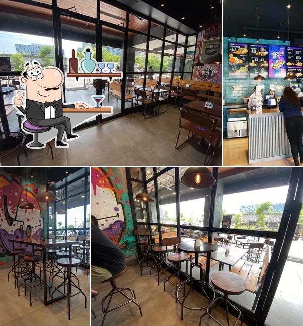 Take a seat at one of the tables at Taco Bell