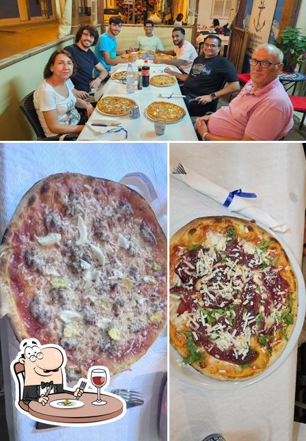 Questa è la foto che mostra la cibo e interni di L'Ancora