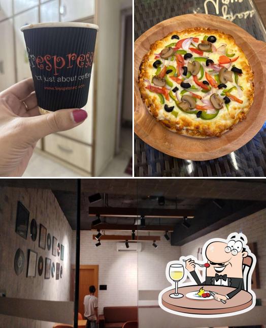 Take a look at the picture depicting food and interior at Cafe Frespresso