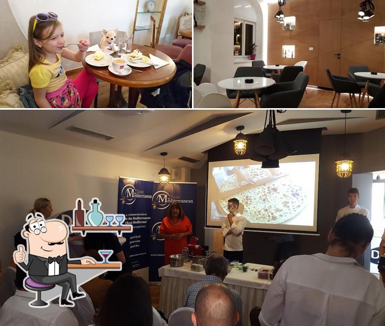 Siediti a un tavolo di Moderato Coffee & Cakes