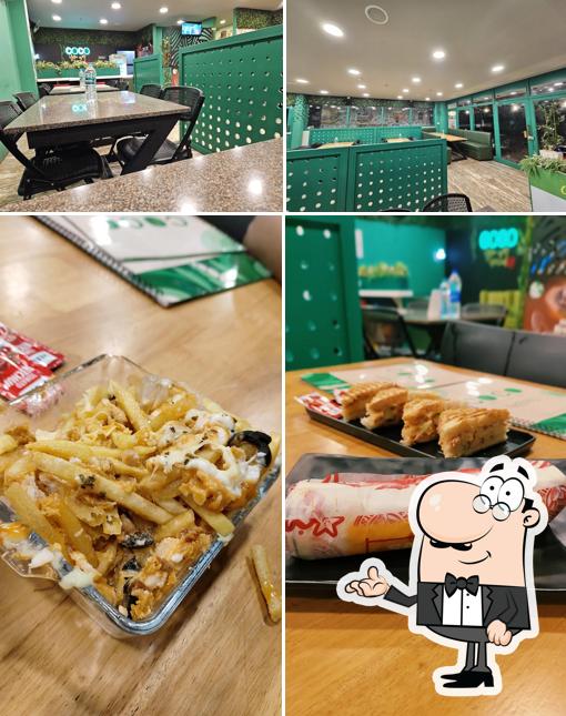 Take a look at the image showing interior and food at COCO FOOD ICE CREAM AND JUICE