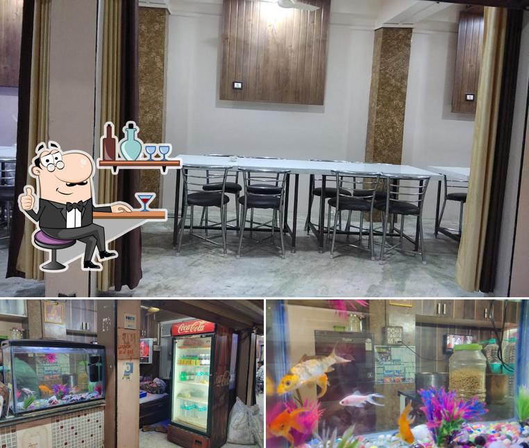 This is the picture depicting interior and beverage at SHRI THAKUR JI KHANA KHAZANA