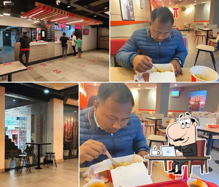 Take a seat at one of the tables at KFC