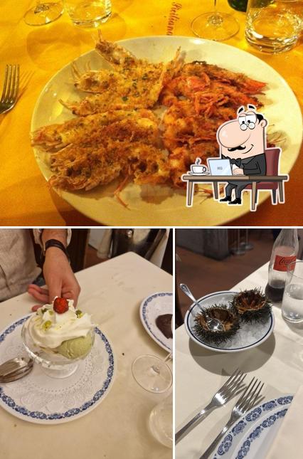 Questa è la foto che mostra la interni e tavolo da pranzo di La Siciliana