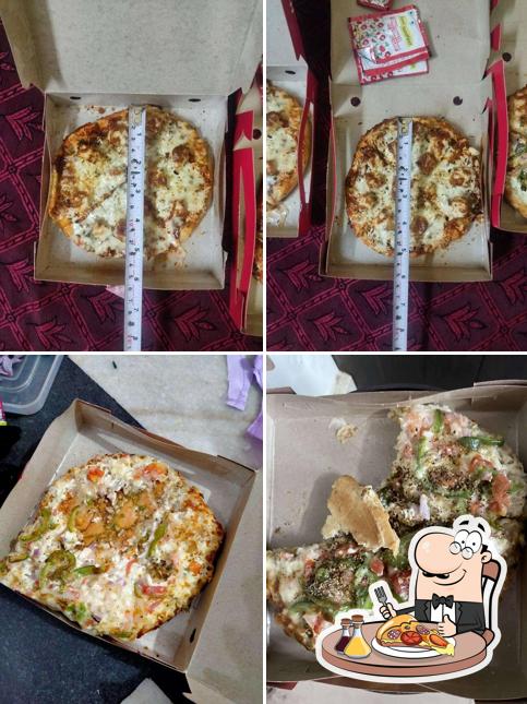 Get pizza at Shivam's Pizza