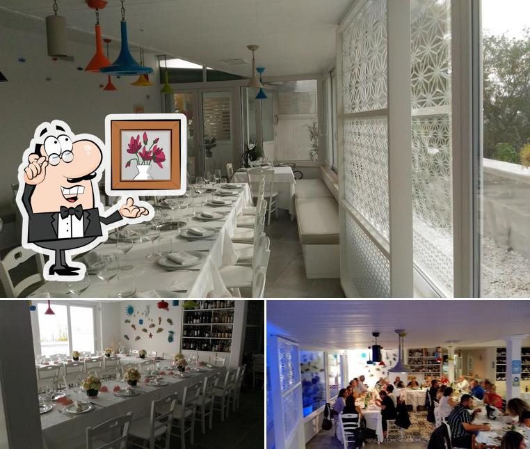 Siediti a un tavolo di Ristorante la Barca