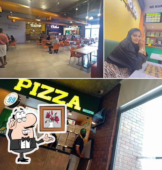 The interior of Pizza Ricotta Indian Mall