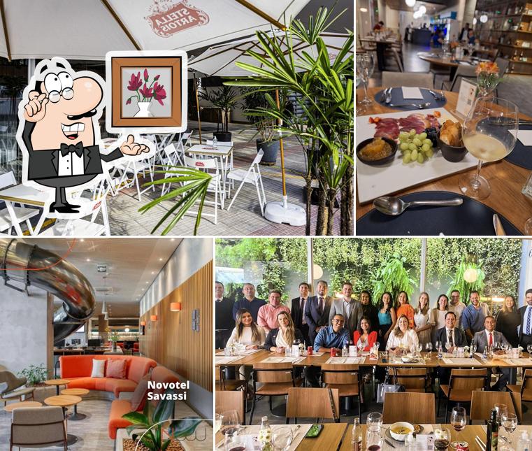 Sente em uma das mesas no Nuúu Restaurante