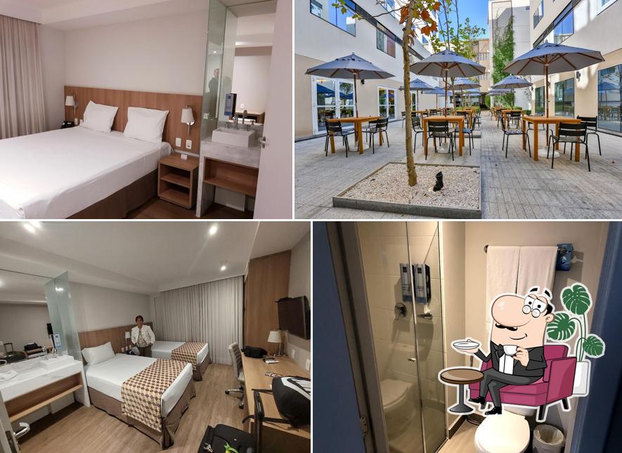 Sente em uma das mesas no Sleep Inn Guarulhos