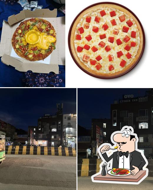 The image of food and exterior at Domino's Pizza Prem Nagar, Gurugram