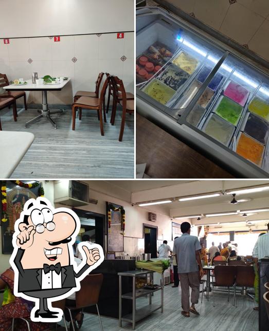 Take a seat at one of the tables at Padmavathi Fast Foods