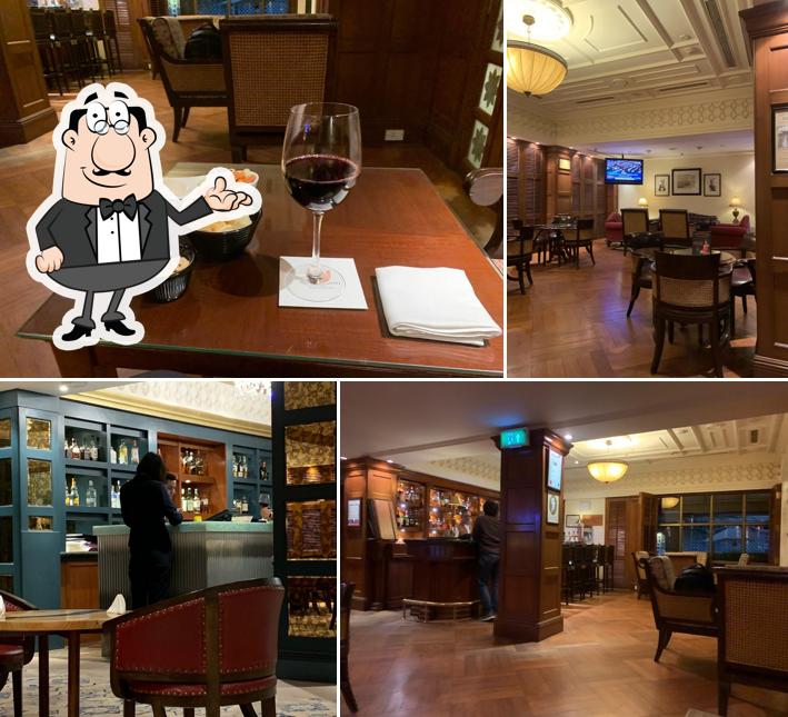 Take a seat at one of the tables at Durrant's bar - Welcomhotel Chennai