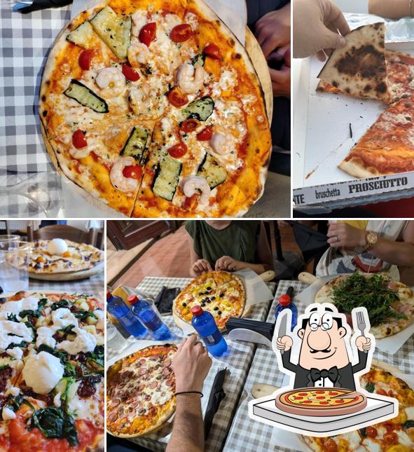 A Pizzeria Della Regina, puoi prenderti una bella pizza