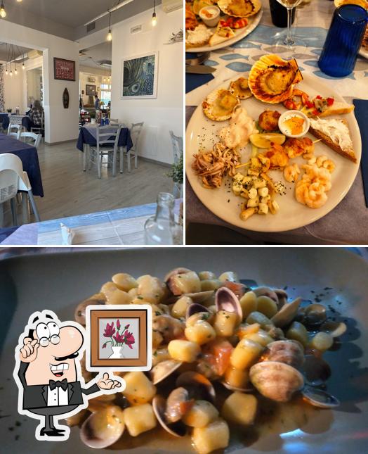 La immagine della interni e cibo di Trattoria OK