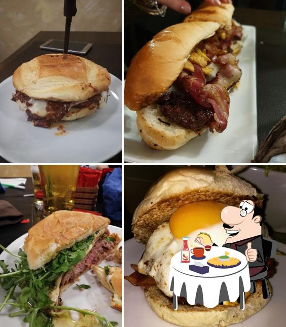 Prenditi un hamburger a Revenge pub e grill