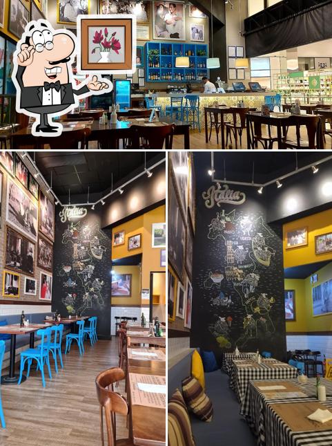 Sente em uma das mesas no Pecorino Bar & Trattoria Balneário Shopping