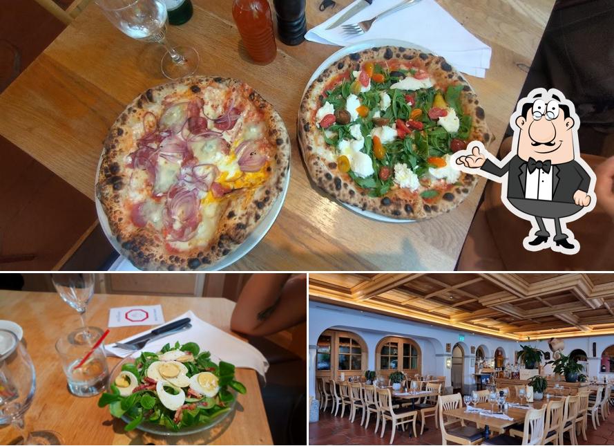 La immagine di interni e tavolo da pranzo da Trattoria Pizzeria il Forno