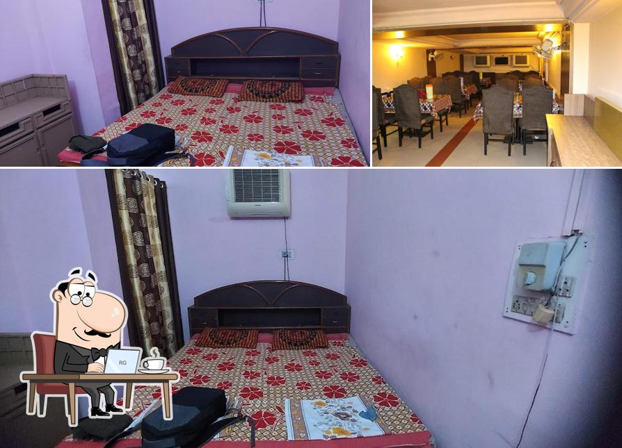 Take a seat at one of the tables at Hotel Avtar Bar & Restaurant