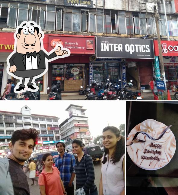 Take a seat at one of the tables at Anns Bakery Kottayam