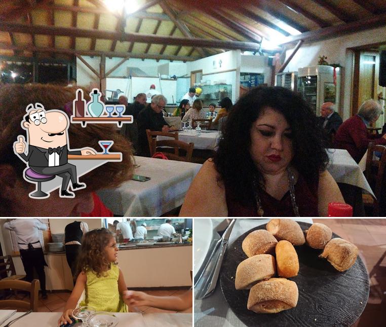 La foto della interni e cibo di La Vecchia Botte