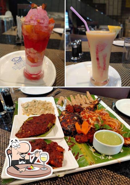 Among various things one can find food and interior at The Fish Sea Food Family Restaurant
