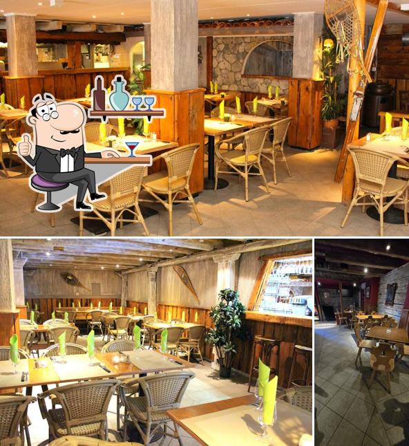 Gli interni di Restaurant Les Flambeaux