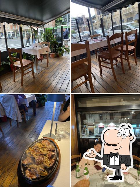 Siediti a un tavolo di L'Angolo Della Pizza