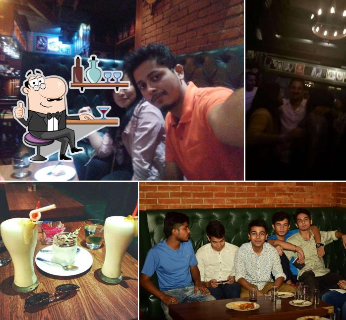 Take a seat at one of the tables at Xs Bar & Lounge