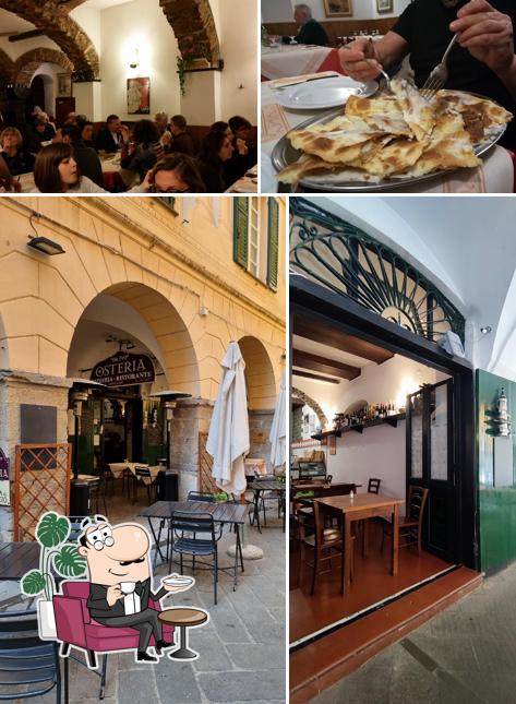 Dai un'occhiata agli interni di Osteria Pizzeria Da Ivo