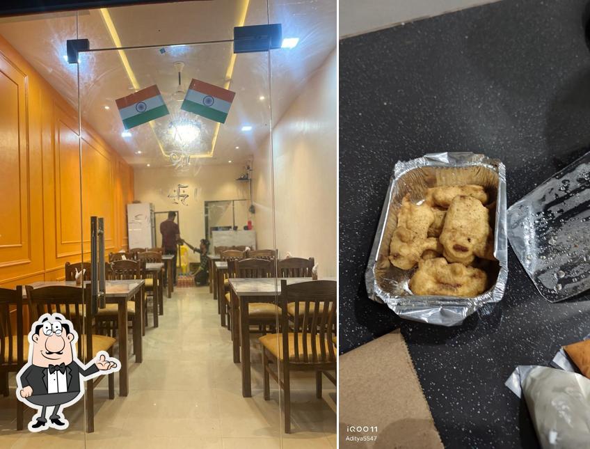 Take a seat at one of the tables at Sai krupa veg resto- best restaurant in alibag