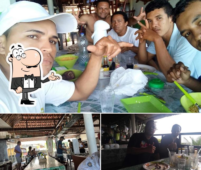 Sente em uma das mesas no Churrascaria Dona Branca