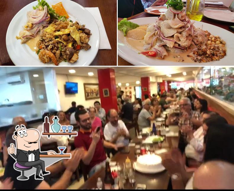 Sente em uma das mesas no Rinconcito Peruano - Itaim Bibi