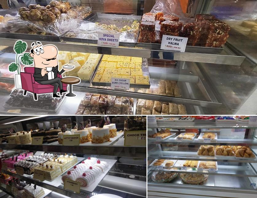 Take a seat at one of the tables at Sarvani Sweets