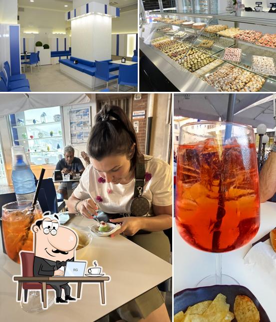 La foto della interni e bevanda di Oscar Cafè