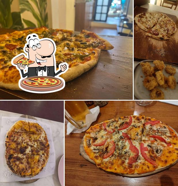 Order pizza at SOLA Bistro & Bar