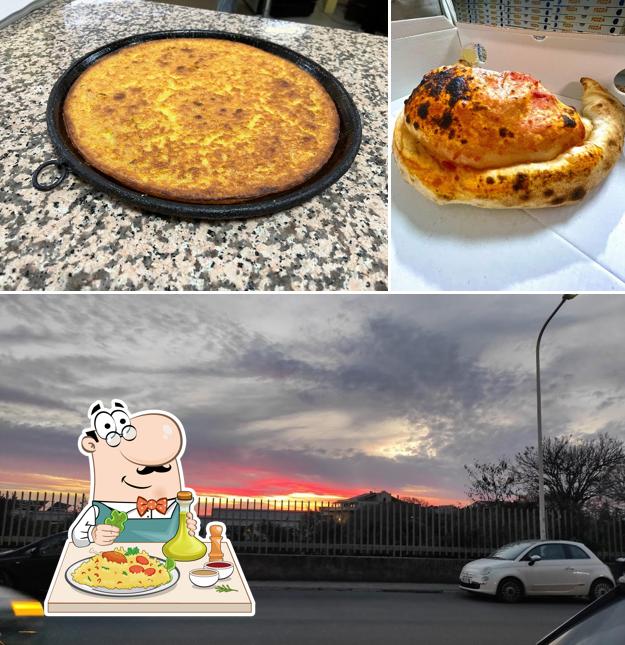 Tra le varie cose da Pizzeria Al Caminetto si possono trovare la cibo e esterno