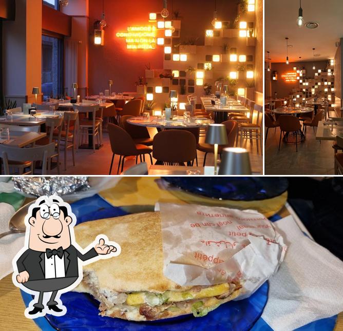 Guarda la foto che raffigura la interni e cibo di Il Cavaliere - Pizzeria con Cucina